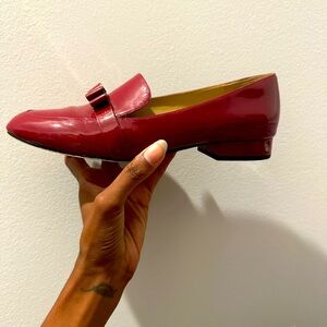 Michael Kors loafers in the color Mulberry